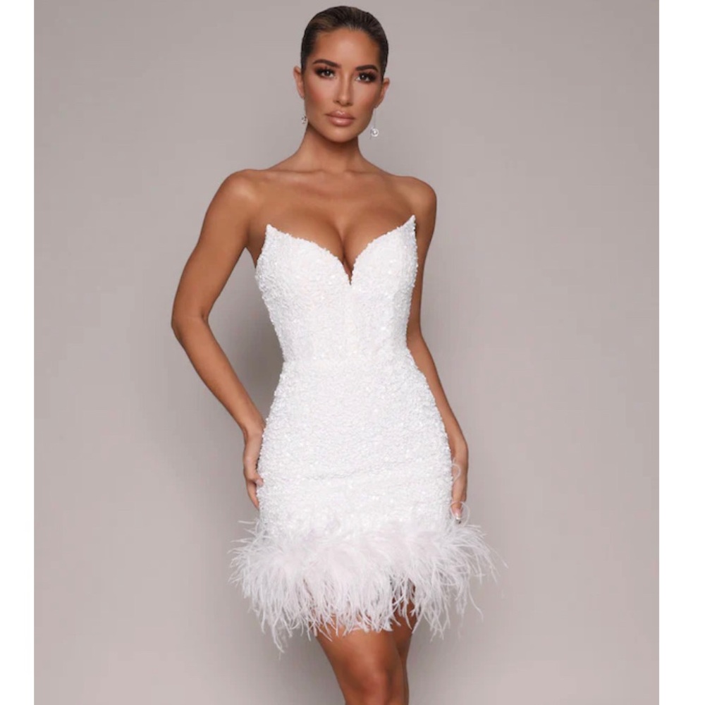 Moda Glam Boutique .. Ziva strapless sequin mini dress with feather trim white